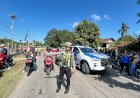 Semangat-Kemerdekaan-Membara,-Polres-Malaka-Kawal-Gerak-Jalan-8-KM-Libatkan-Pelajar-dan-OPD