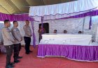 Polsek-Laenmanen-Kawal-Kedatangan-Jenazah-PMI-Asal-Malaka,-Pastikan-Pemulangan-Berjalan-Aman-dan-Kondusif