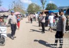Hari-Pasar-Kaputu,-Polisi-Hadir-Jaga-Kenyamanan-dan-Ketertiban-Warga