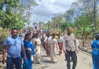 Polsek-Laenmanen-Amankan-Prosesi-Perarakan-Patung-Ina-Maria-Na’i-Feto,-Berjalan-Tertib-dan-Kondusif