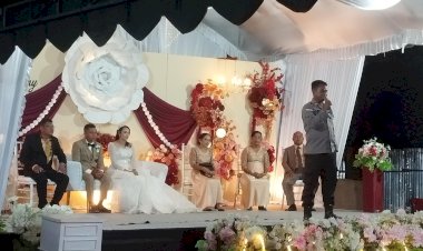 Polsek-Wewiku-Pastikan-Resepsi-Pernikahan-di-Desa-Alkani-Berlangsung-Aman-dan-Kondusif