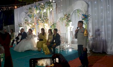 Kawal-Momen-Bahagia-Warga,-Polsek-Malaka-Timur-Hadir-Pastikan-Pesta-Pernikahan-di-Desa-Kusa-Berlangsung-Aman