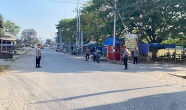 Strong-Point-Pagi-Polres-Malaka-di-Perempatan-CDM,-Hadirkan-Rasa-Aman-bagi-Pengguna-Jalan
