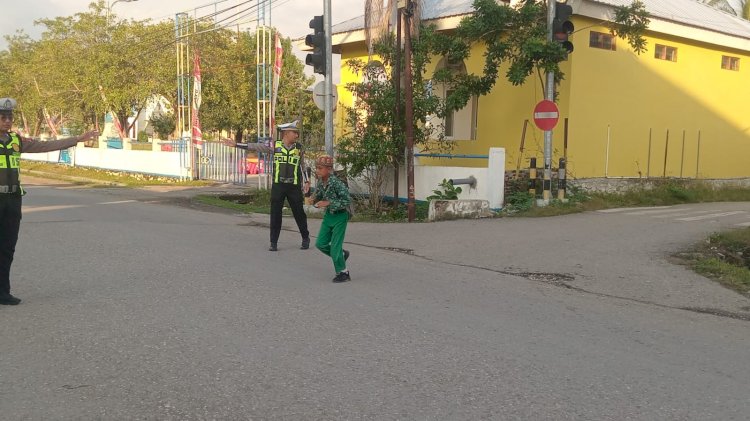 Langkah Tulus di Pagi Hari, Satlantas Polres Malaka Hadir Menjaga Keselamatan dan Mengantar Harapan Anak Bangsa