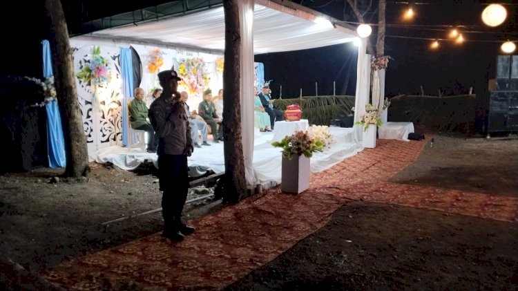 Jaga Momen Bahagia Warga Tetap Aman, Polsek Malaka Timur Pantau Pesta Pernikahan di Desa Dirma